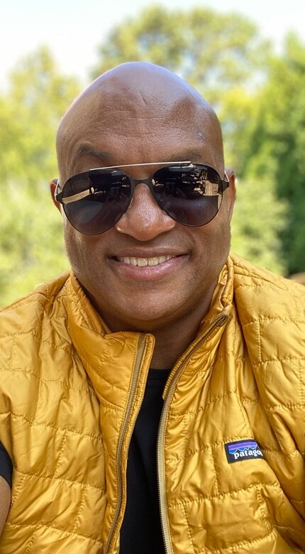 Patient in sunglasses smiling outdoors - Cornerstone Dental Arts smile gallery Knoxville TN
